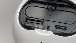 Eject the SD by pushing with your fingernail or by using a spudger