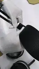 Insert the new headstrap as shown into the headband by inserting the headstrap-headband interface into the headband, but do not yet press the interface into the headband.