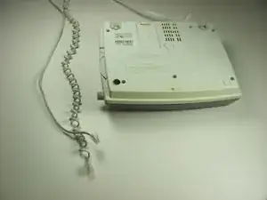Disconnection of phone cord from phone and base