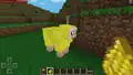 Ein gelbes Schaf vor Alpha 0.7.1.