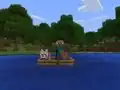 Ein Spieler angelt von seinem Boot aus in der Bedrock Edition