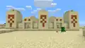 Zwei Wüstentempel wurden in der Bedrock Edition passend ineinander generiert.