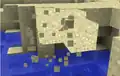 In der Luft schwebender Sand fällt durch das Zerstören eines anliegenden Blockes hinunter; davor schwebte er wegen eines Fehlers in der Luft.