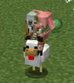 Ein Hühnerreiter aus zombifiziertem Schweini und Huhn