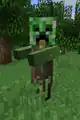 Ein Zombie-dorfbewohner trägt einen Creeperkopf