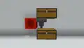 Ein Redstone-Block sperrt einen Trichter.
