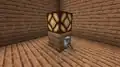 ... und eine eingeschaltete Redstone-Lampe.