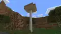 Ein besonders hoher brauner Riesenpilz im Sumpf der Pocket Edition.