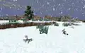 Drei weiße Kaninchen während es schneit