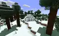 Ein Iglu zwischen den Fichten einer verschneiten Taiga