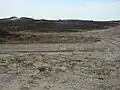 Übungsgelände mit Panzerspuren