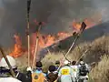 Kontrolliertes Abbrennen von Grasflächen am Vulkan Aso