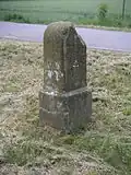 Überarbeiteter Ganzmeilenstein im OT Nennigmühle