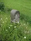 Überarbeiteter Halbmeilenstein unweit des OT Hirschberg