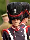 Grenadier Sardiniens, in traditioneller Uniform, mit roten Schulterwülsten zum Fixieren des Koppelzeugs, 2007