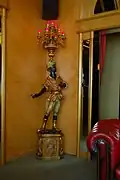 „Gilded Turkish figurines holding red lamps“, 2009
