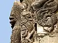 Detail am Prang: Naga und Deva