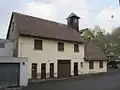Feuerwehr-/Toilettenbau (1950) am Schulhof