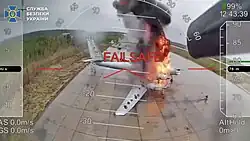 Brennender TU-95-Bomber auf dem Militärflugplatz Olenya