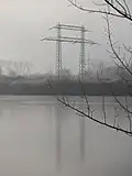 Portalmast der 220-kV-Leitung Lehrte–Borken in der Leineaue bei Rethen