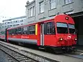 Vertikaler gelber Streifen bei einem Wagen der Appenzeller Bahnen