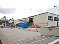 Teilweise abgerissene Turnhallen und vollständig Abgerissene Aula des Asam-Gymnasiums München
