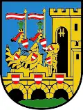 Rot-weiß-rote Bindenschildchen (drei an der Brücke, je eins bei zwei Rittern; Vöcklabruck, AT)
