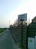 Beginn einer geschlossenen Ortschaft in Aaigem