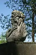 Skulptur Januskopf & Echsenwesen