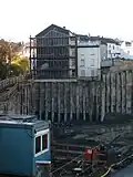 Bohrpfahlwand mit abgesichertem Haus – Aquis Plaza, Aachen
