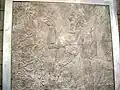 Assyrisches Relief: Geist mit Menschenkopf bewässert heiligen Baum