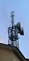TIM Basisstation mit HSPA+ (2100&nbsp;MHz, Antenne unten) und LTE (800&nbsp;MHz, Antenne oben) in Mals