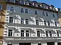 Einzelne Diamantquader als gründerzeitliche Fassadenzier (München, Baaderstraße 30)