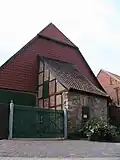 Ehemalige Vorwerksscheune mit Herzogswappen