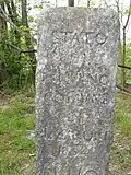Grenzstein von Herzogtum Mailand im Ortsteil Santa Margherita (354&nbsp;m), im Hintergrund Schweizer Gebiet