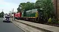 Lok Nr. 1202 mit einem Zug aus Caboose-Wagen, Juli 2012