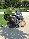 Lumpensammler mit Tonne
