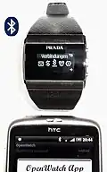 Smartwatch von Prada mit sich selbst stellender Uhrzeit über Bluetooth per Smartphone-App, erschienen ca. 2008