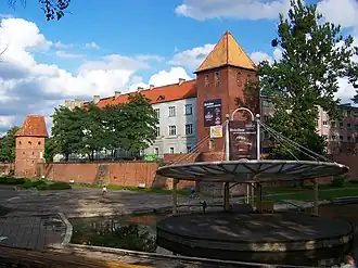 Collegium Hosianum mit Stadtgraben, Pflaumengrund und Freilichtarena