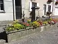 Einer der Dorfbrunnen