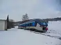844.025 auf der Linie U27 an der Haltestelle Brtníky (Ústecký kraj, 2015)