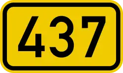 B437