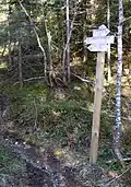 Wegweiser zum Wanderpfad