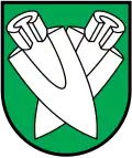 Zwei gekreuzte und gestürzte Pflugscharen im Wappen von Berken BE