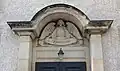 Detail des linken Seitenportals
