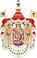 Großes Wappen Preußens mit den Collanen des Schwarzen und des Roten Adlerordens, des Hausordens von Hohenzollern und dem Ordensband des Kronenordens (von unten nach oben).