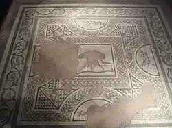 Mosaik aus Colchester mit Eroten als Ringer im Mittelfeld