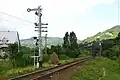 Nördliches Einfahrsignal und die Eisenbahnbrücke über den Sălăuța