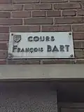 Straßenschild in Dünkirchen (seit dem 30. März 1962 nach ihm benannt)[5]
