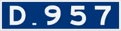 D957